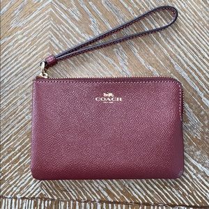 NWT Coach wristlet (wine)